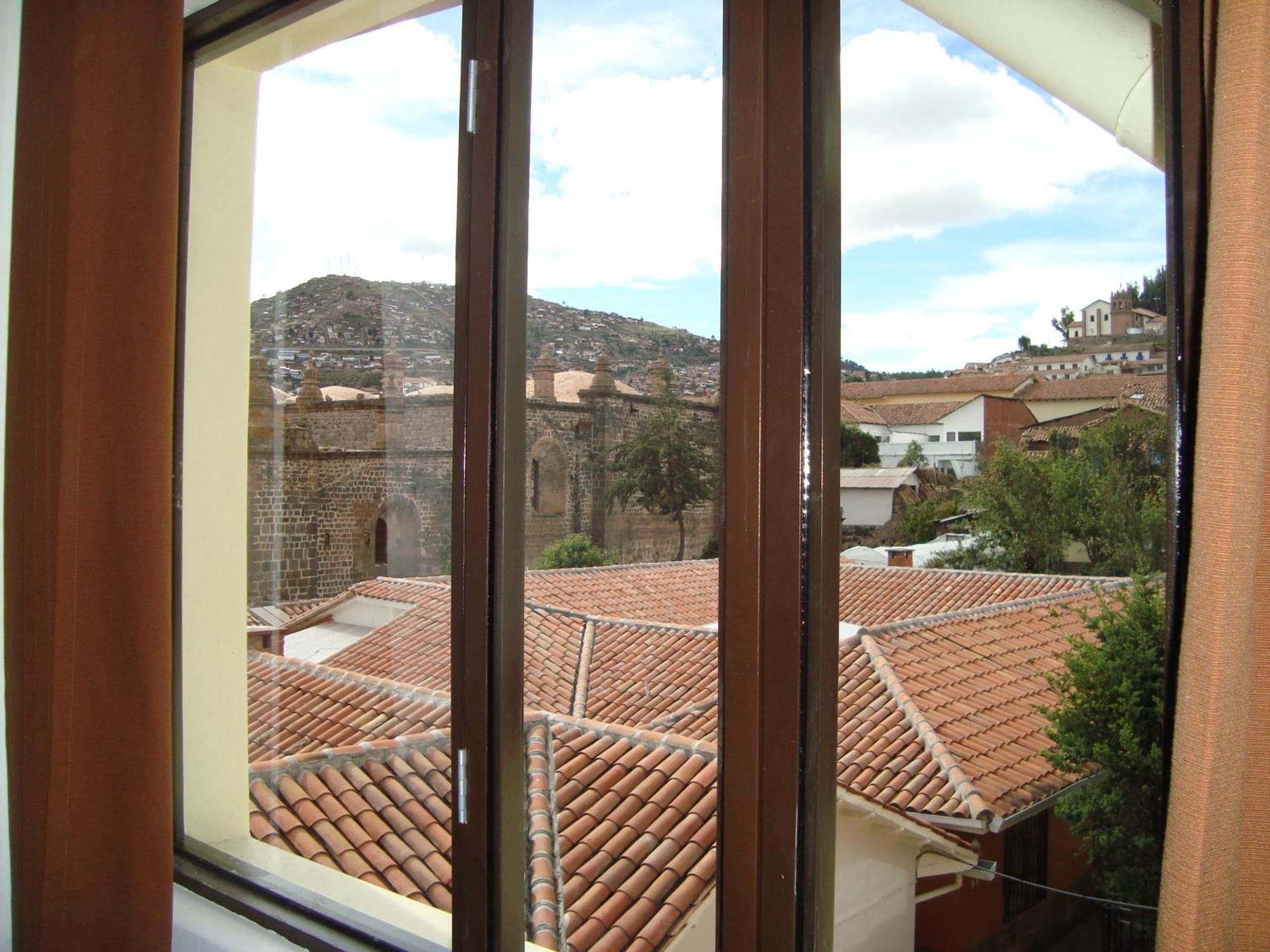 Hostal & Apartments El Triunfo Куско Экстерьер фото