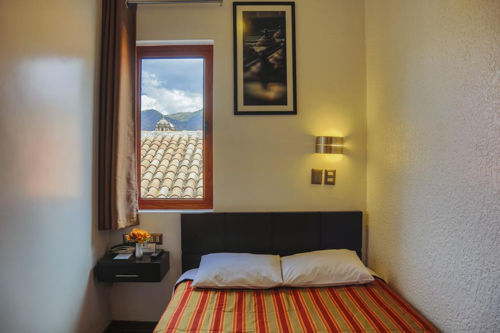 Hostal & Apartments El Triunfo Куско Экстерьер фото