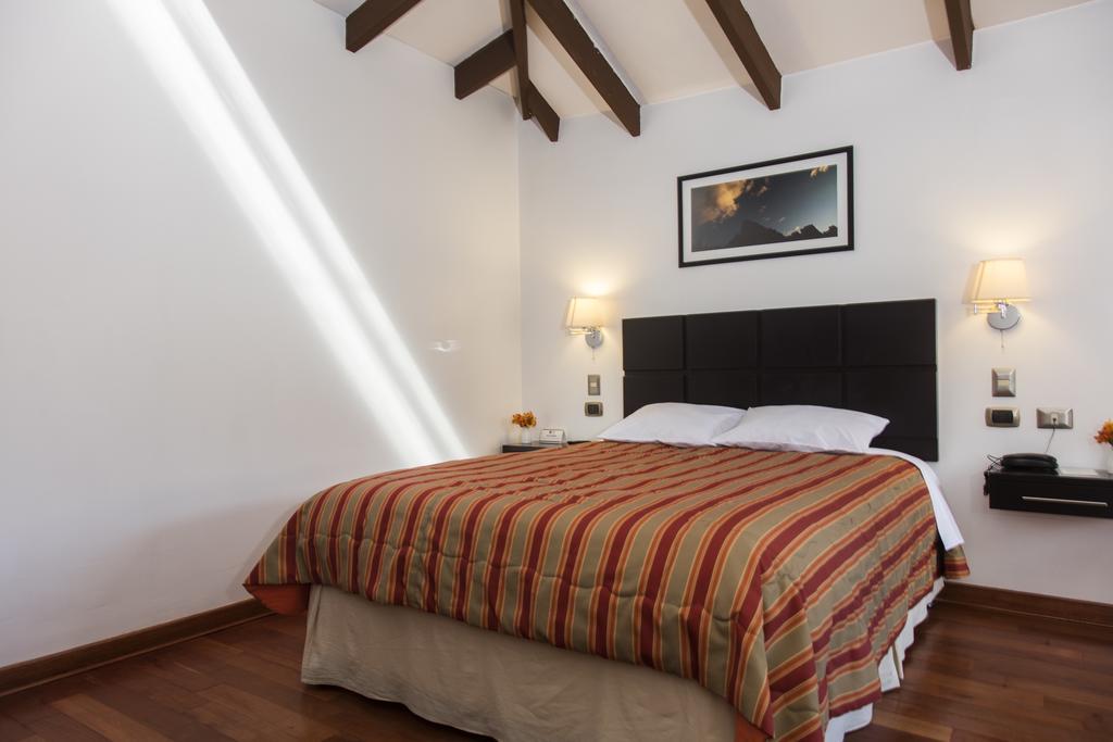 Hostal & Apartments El Triunfo Куско Экстерьер фото