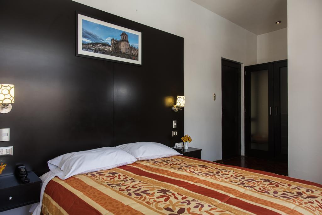 Hostal & Apartments El Triunfo Куско Экстерьер фото