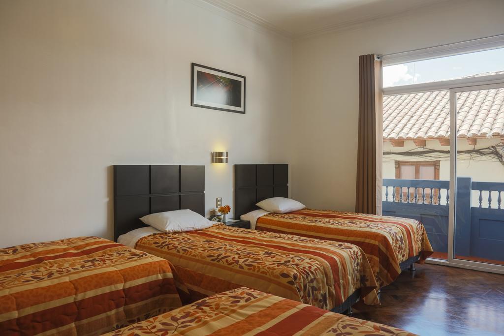 Hostal & Apartments El Triunfo Куско Экстерьер фото