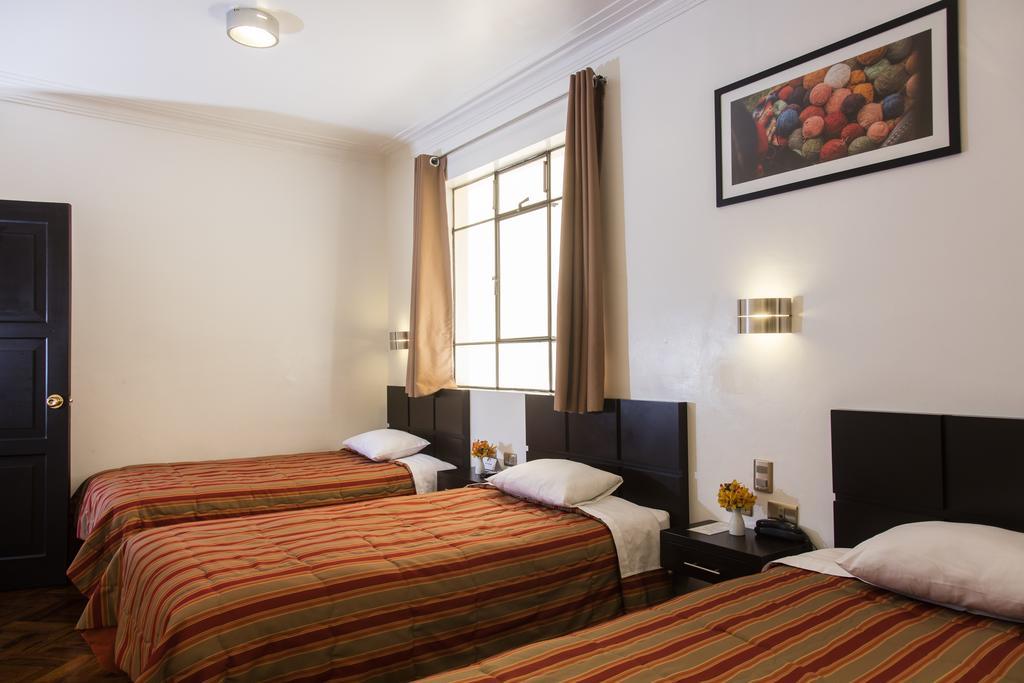 Hostal & Apartments El Triunfo Куско Экстерьер фото